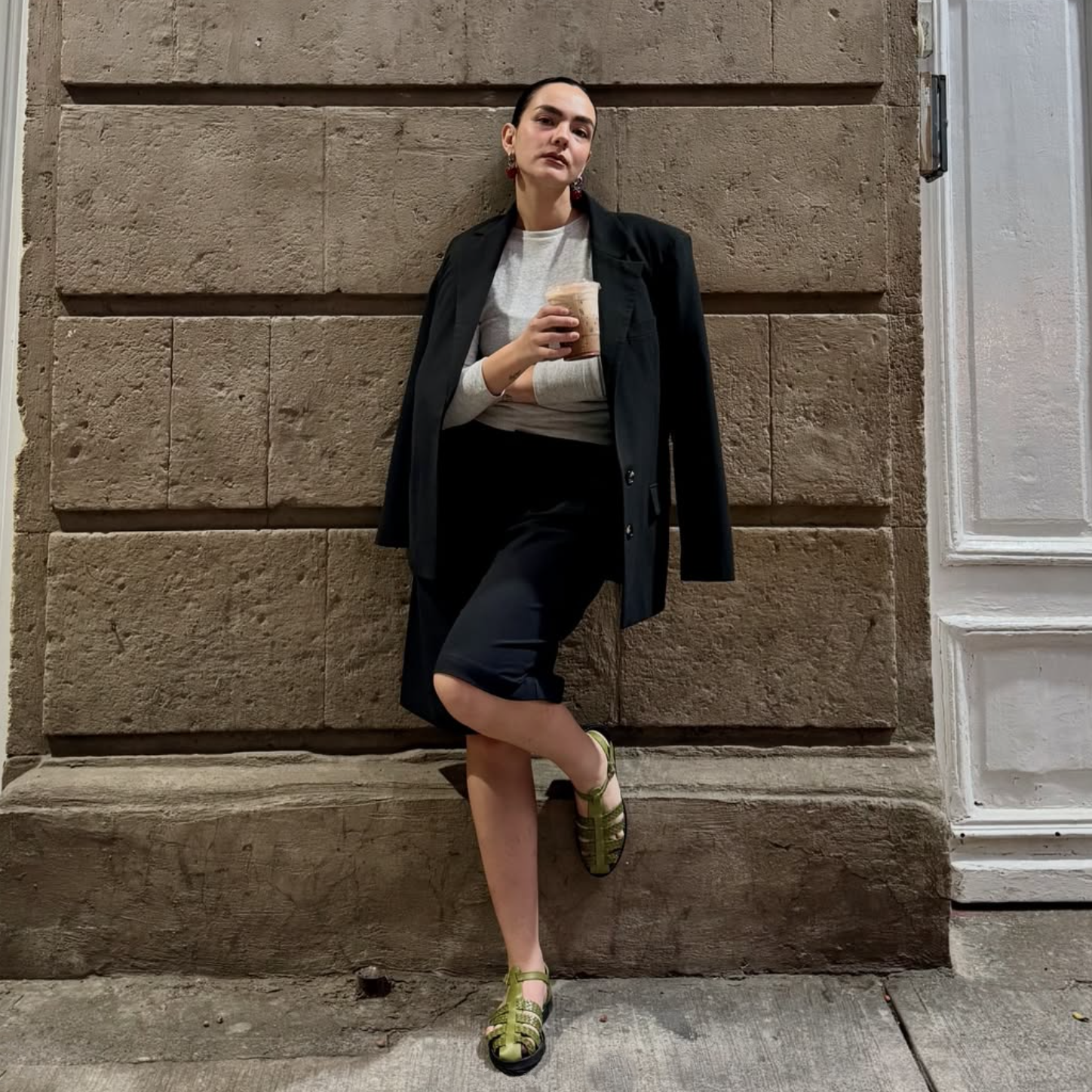 Cayucas Alma, olive green woven leather huarache fisherman sandal worn with blazer and midi skirt, handmade in Mexico